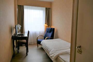 Фото номера Одноместный номер с общей ванной комнатой Хостелы Linnanpiha Bed &amp; Breakfast г. Раума 10