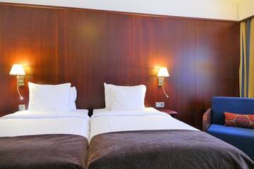 Фото номера Стандартный двухместный номер с 2 отдельными кроватями Отель Hotel Kalliohovi г. Раума 3