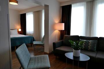 Фото номера Улучшенный двухместный номер с 1 кроватью Отель Hotel Raumanlinna г. Раума 4