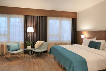Фото номера Улучшенный двухместный номер с 1 кроватью Отель Hotel Raumanlinna г. Раума 2