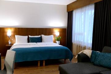 Фото номера Улучшенный номер с кроватью размера «king-size» Отель Hotel Raumanlinna г. Раума 2